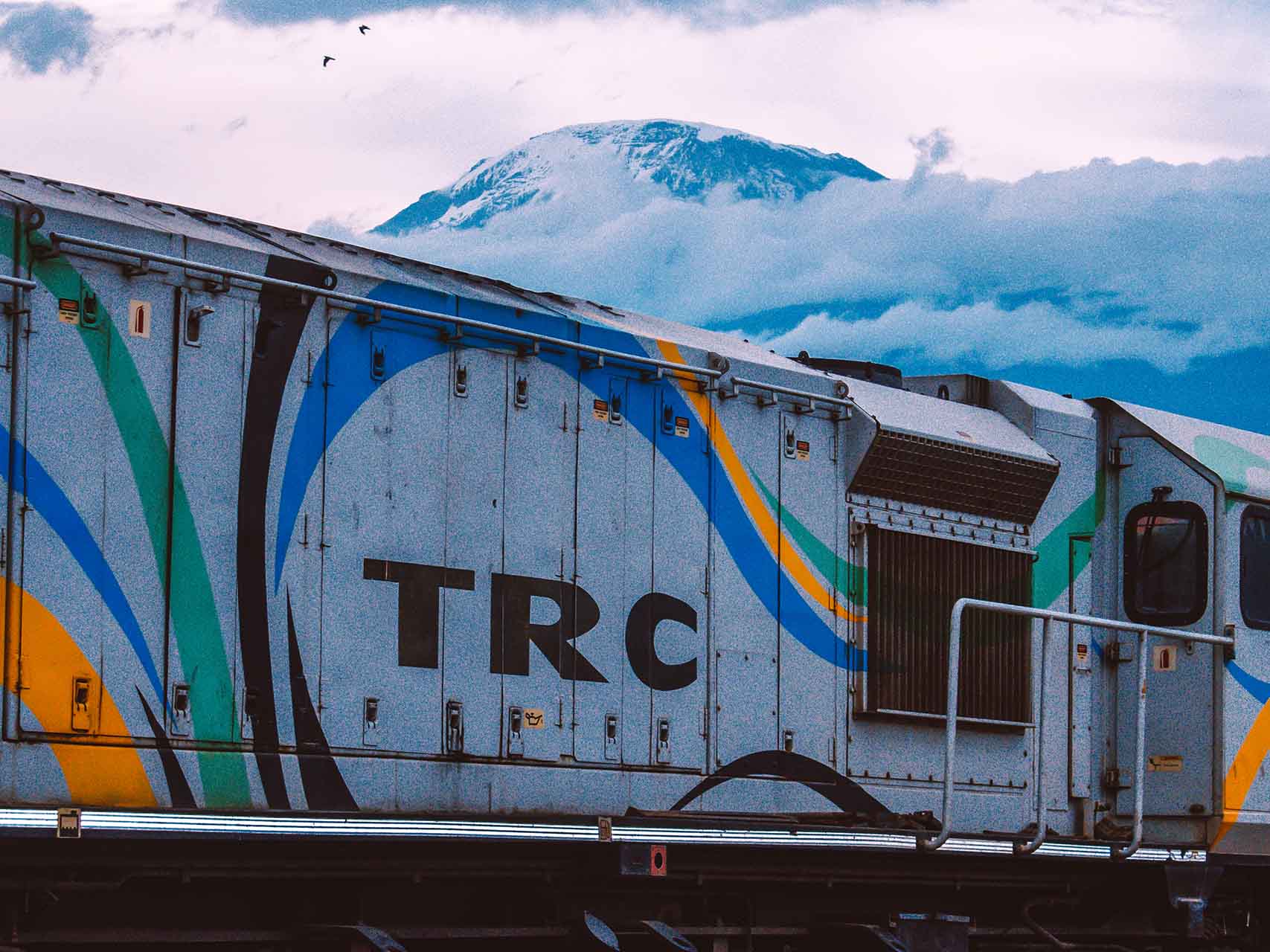 an image of Mount Kilimanjaro peeping off the top of the Tanzania Railway Corporation's train. Beautiful photo, right? I'm pretty sure you don't see anything wrong with it.